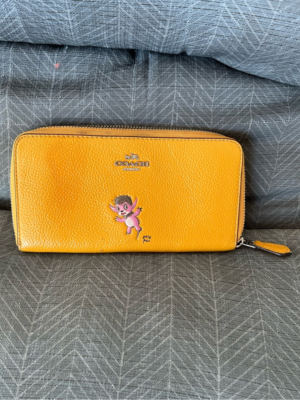 Coach x Gary BasemanYellow Pebbled Leather Zip Wallet with Pink Character